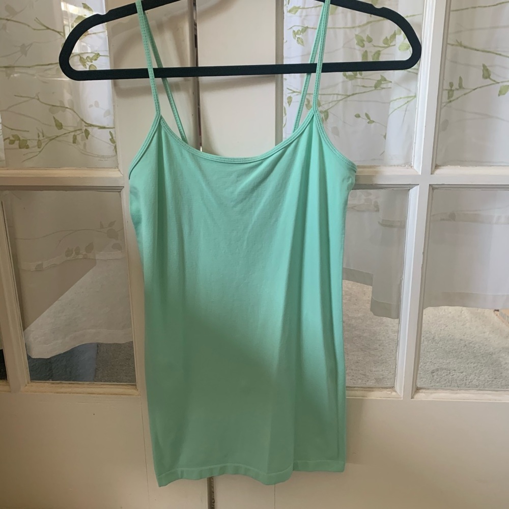 4 Tank Tops. $10 each